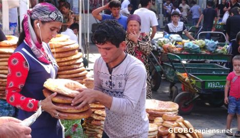 Postcard Selling bread in the bazaar