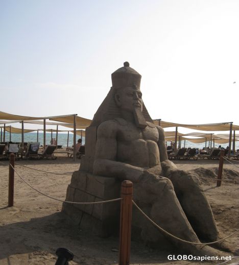 Postcard sand statue