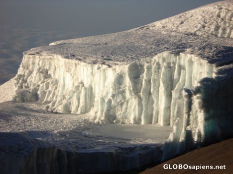 Postcard Glacier ice receding away from the mountain