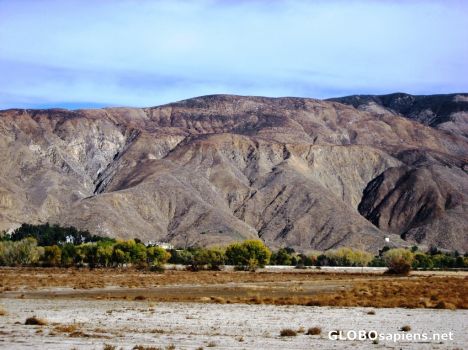 Postcard Mountains Rise sharply from Desert Floor
