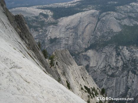 Postcard Half Dome - A look over the side down the Cables