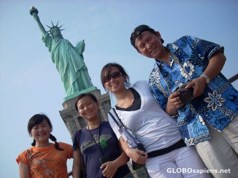 Postcard Family at the Statue of Liberty in New York