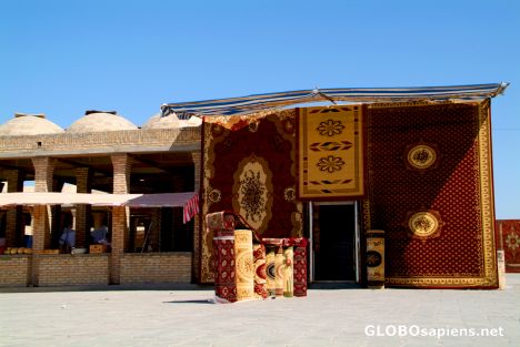 Postcard Bukhara - carpets in the market