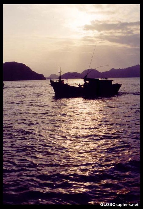 Postcard Sunset on Halong Bay, near Cat Ba Island, Vietnam