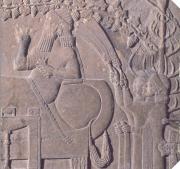 Fragment of a stone relief representing King of Assyria Assurnasirpal II