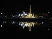 Wat Jong Klang reflected in a small man made lake.