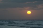 The sun setting over the Sao Marcos Beach