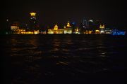 Bund, Shanghai's most famous street. At night photographed from across Pudong.