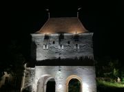 The Tailors' Tower at night.