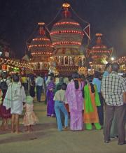 pilgrims throng the sacred enclave round the temple