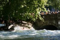 Start slide show: Eisbach river surfers in downtown Munich