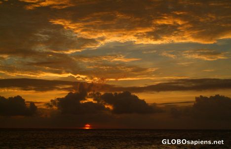 Postcard Arubian sunset with clouds