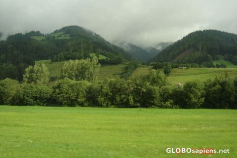 Postcard Countryside from a running train
