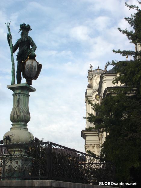 Postcard Kollegienkirche and a statue