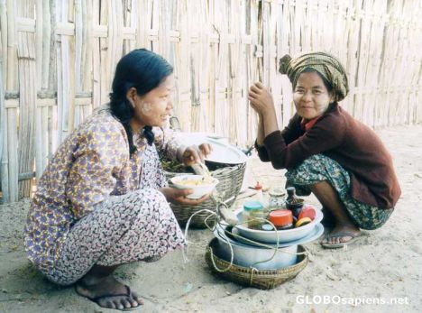Postcard Wandering vendor and customer in Bagan