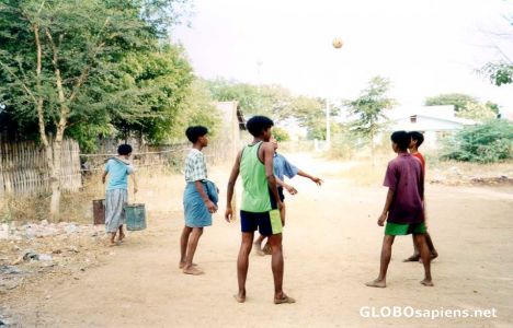 Postcard Village boys playing chin-lone in Pagan