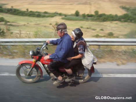 Postcard Lovely and inspiring couple in a bulgarian bike.