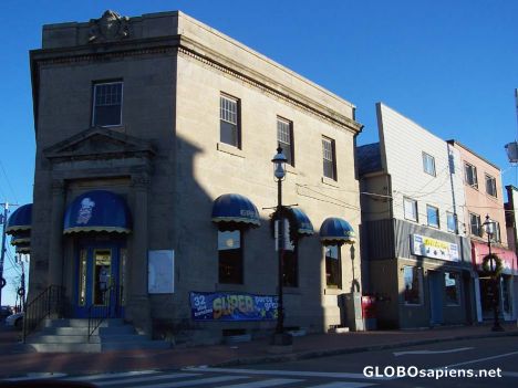 Postcard The old bank is now a pizzaria on Main St