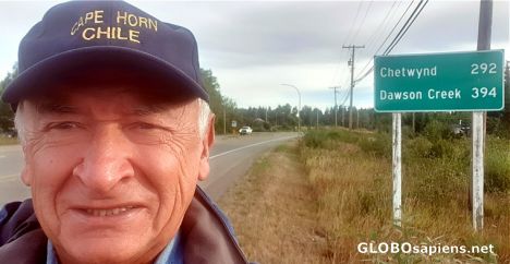 Postcard Hitchhiker on the empty road