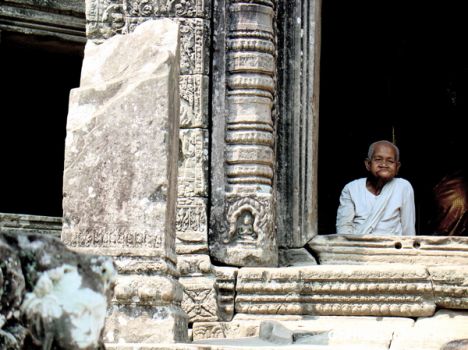 Postcard woman budist monk at angkor thom