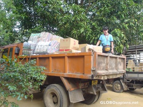 Postcard Averill on dump truck