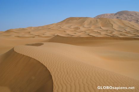 Postcard Waves in an ocean of sand
