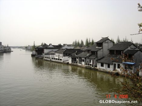 Postcard river town village
