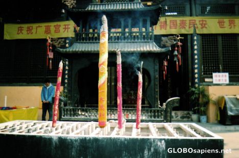 Postcard Burning large incense sticks