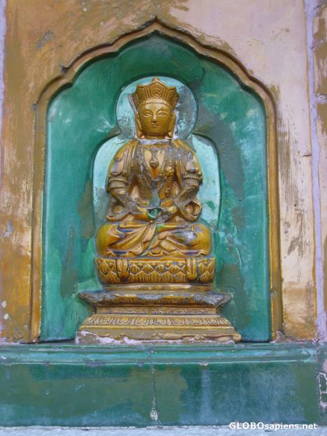 Postcard Small Buddha carved into the wall