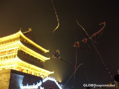 Postcard Flying kites at night