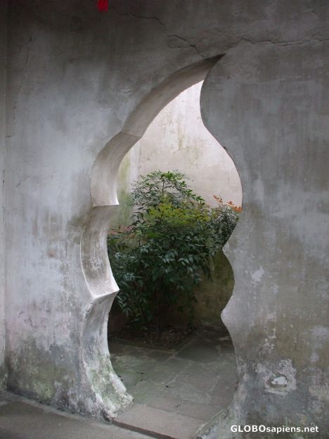 Postcard Funky shaped doorway in Yuyuan Garden