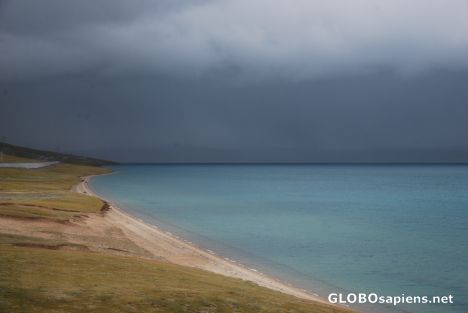 Turquoise water and dark sky