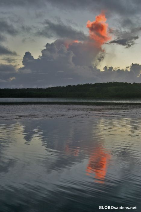 Postcard Sunset reflections on Aitutaki lagoon