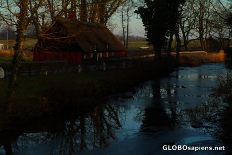 Postcard Funen - house by a river