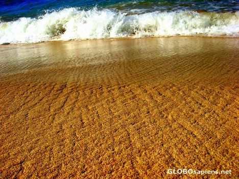 Postcard sand reaching the wave...or the wave the sand?
