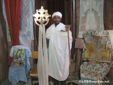 Postcard Monk with an old cross.