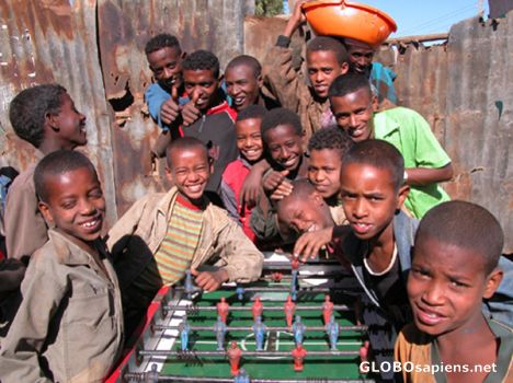Postcard Kids playing futbito.