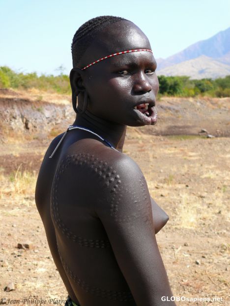 Postcard Mursi girl