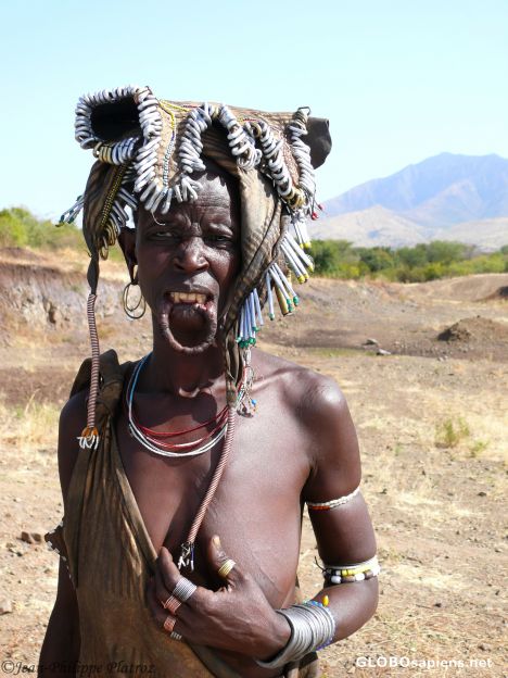Postcard further info about labial plate in the Mursi Tribe