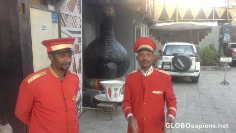 Doormen at the gate of fancy restaurant Abisinya
