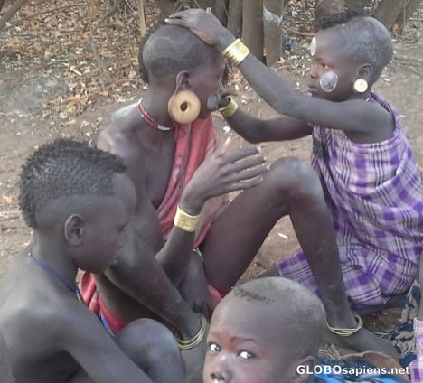 Postcard Kids painting their faces