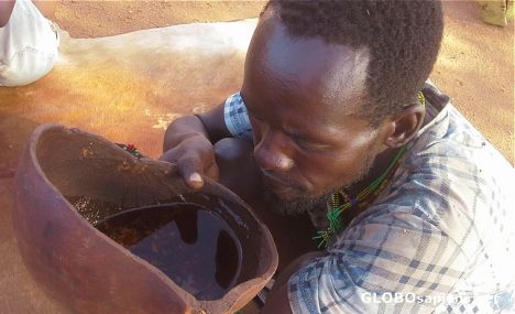 Postcard Drinking coffee from calabash dish