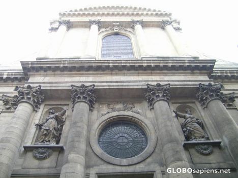 Postcard upward view of church on rue saint-sulplice