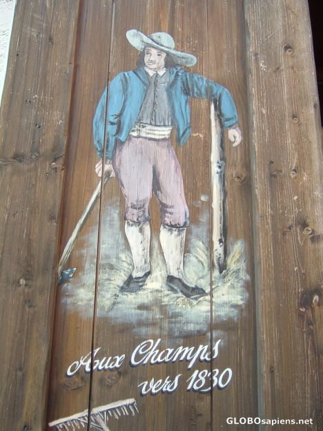 Postcard Art on a house wall