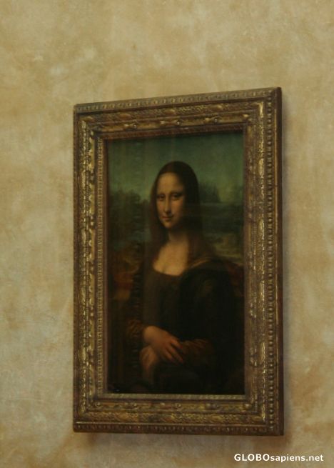 Postcard Mona Lisa behind the armour-plated pane in Louvre.