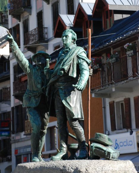 Postcard climber statue