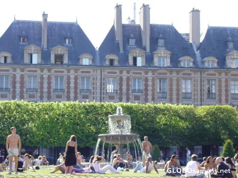 Postcard this is a park in the marais district of paris...