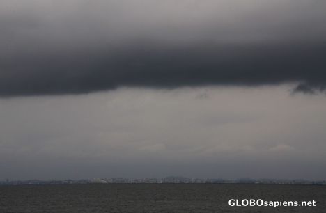 Postcard Pointe Denis (GA) - storm threatens the capital
