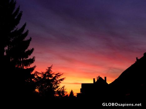 Postcard A sky in Black-Red-Gold