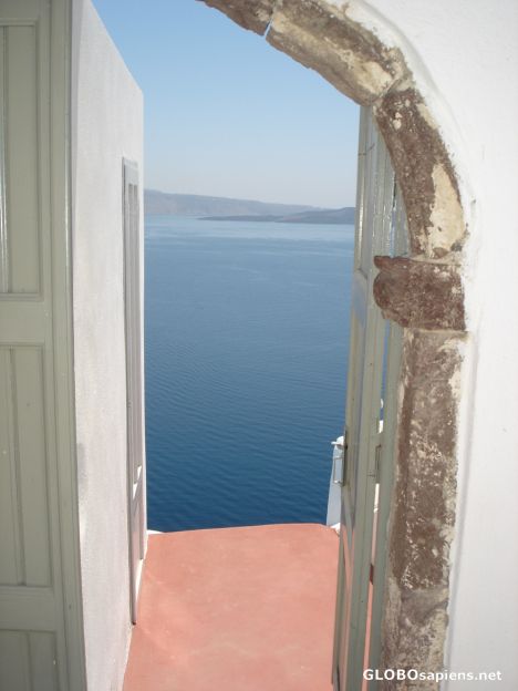 Postcard View through a door